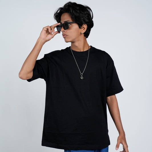 Noir Classic: Effortless Style with this Black Round Neck Tee