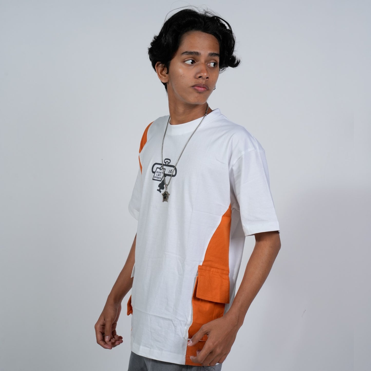 SONIBROS  Bold Comfort: Oversize Pocket Orange Design T-Shirt for Effortless Style